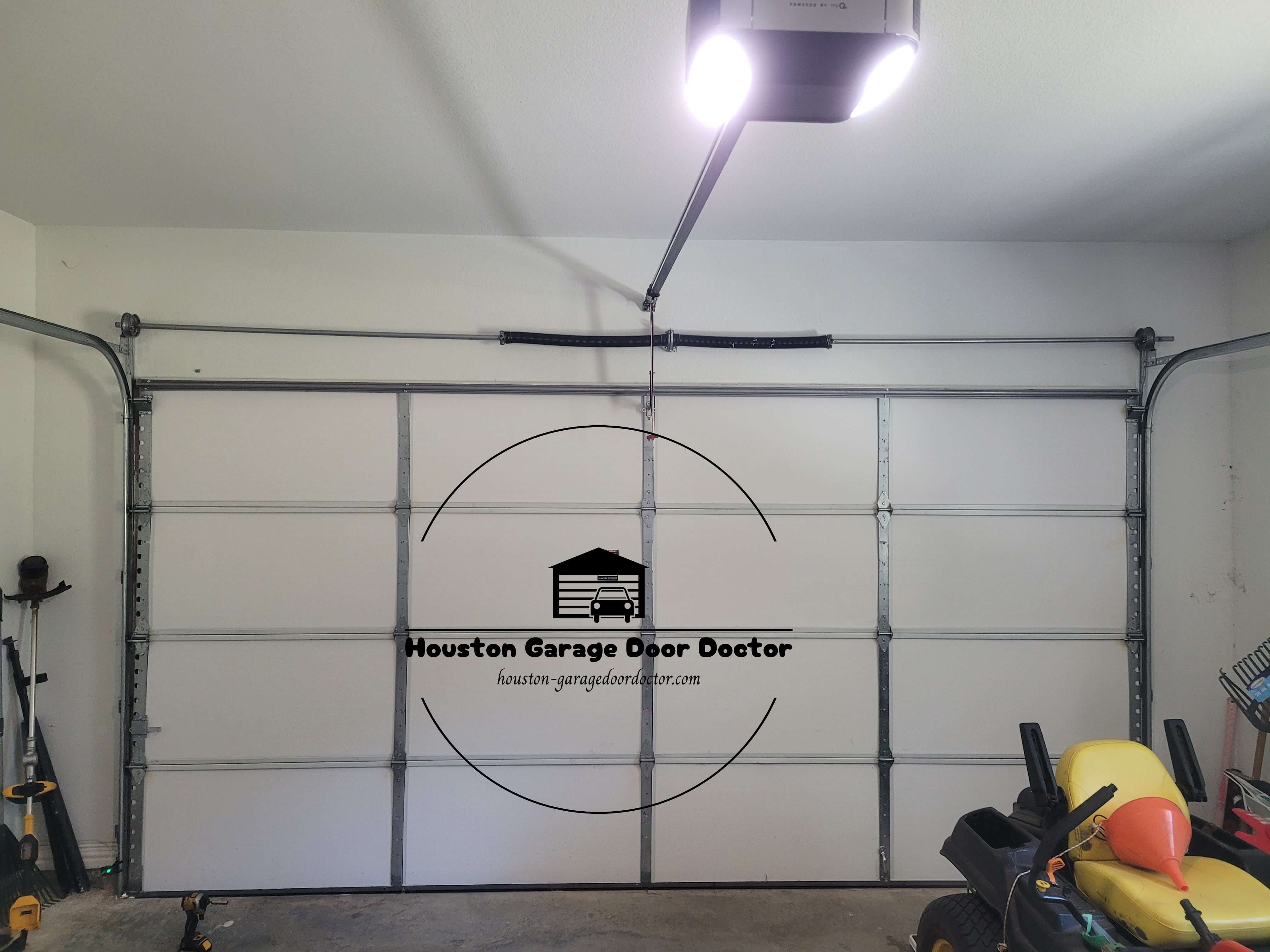 houston-garagedoordoctor.com_garage_door_torsion_spring_replacement